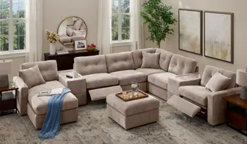 Living room with light-colored modular sectional sofa, recliners, and ottoman