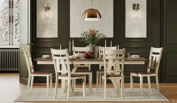 Set dining table with six chairs, pendant light, and wall sconces in a green room