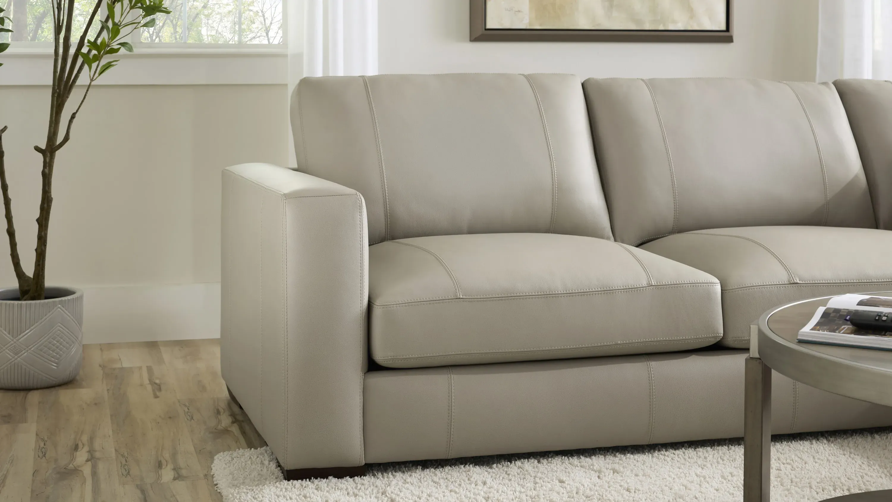 Oaklynn Leather Left Arm Facing Loveseat | Raymour & Flanigan